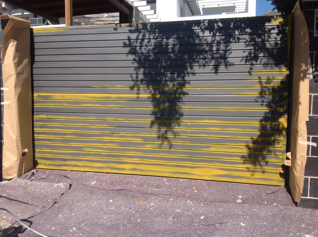 Porton garaje oxidado pintor en malaga